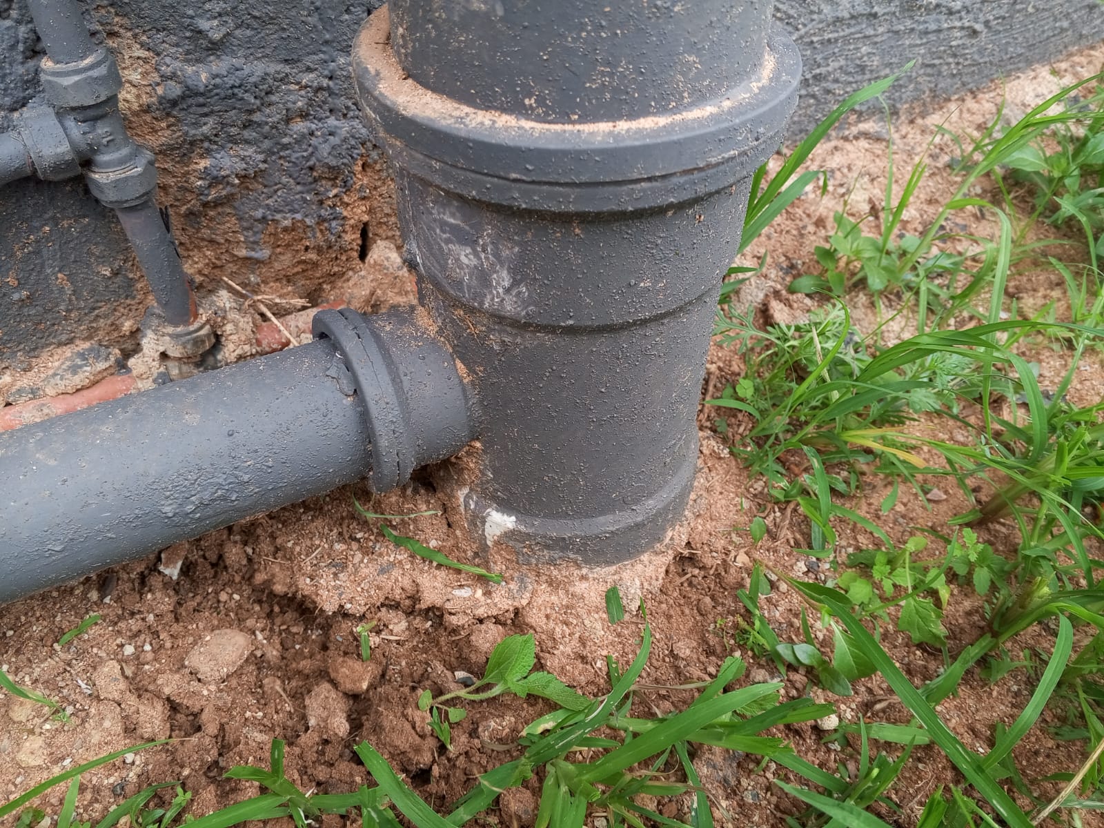Drain and pipe connection outdoors