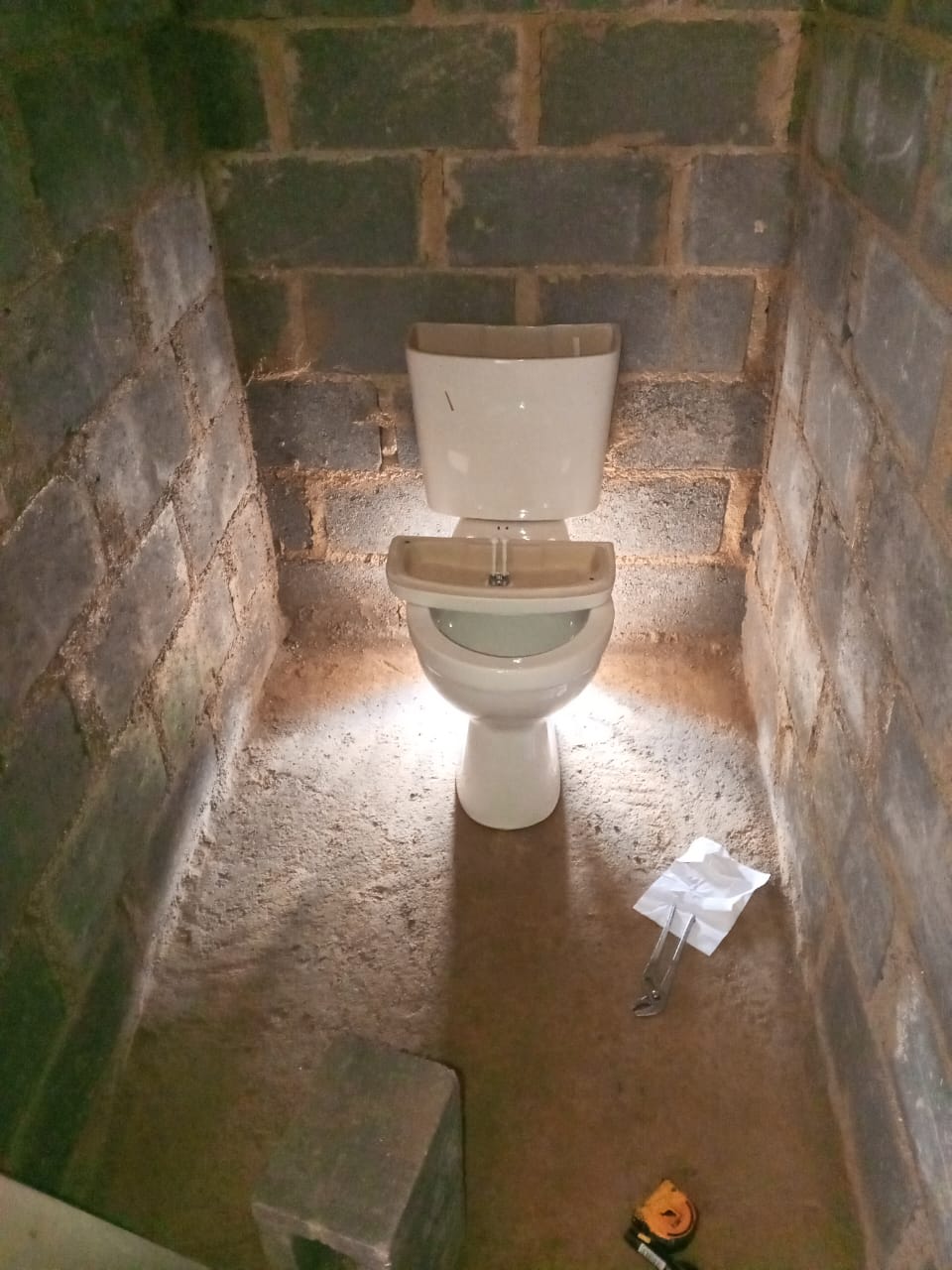 Toilet installation in unfinished room